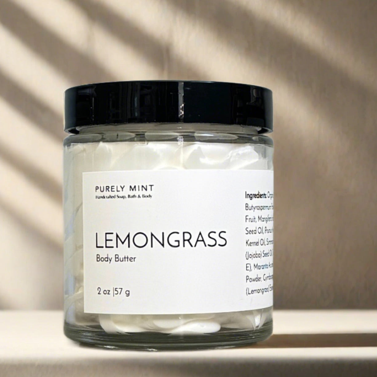 2 oz white body butter in glass jar with black lid, advertising style shot, soft sun shadow, empty penthouse, scandinavian minimalism, neutral warm, detailed