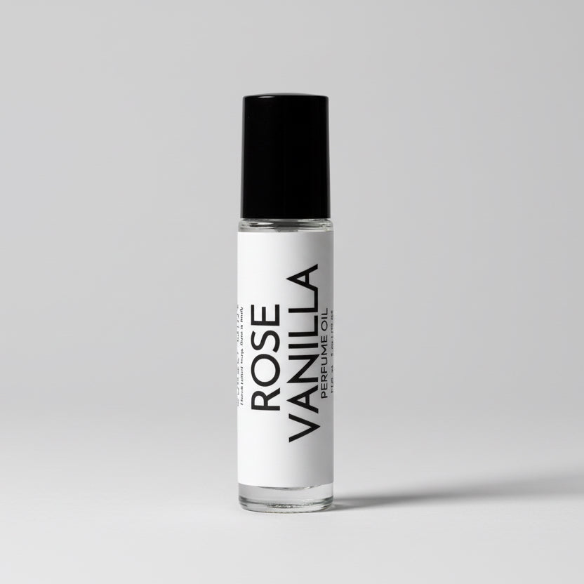 A light gray background features a roll-on perfume bottle labeled ‘Rose Vanilla’.