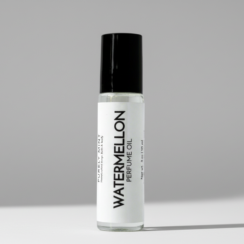 Perfume oil bottle labeled 'Watermelon' on a neutral background