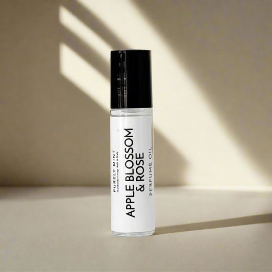 Perfume roller, white label, black top, advertising style shot, soft sun shadow, empty penthouse, scandinavian minimalism, neutral warm, detailed