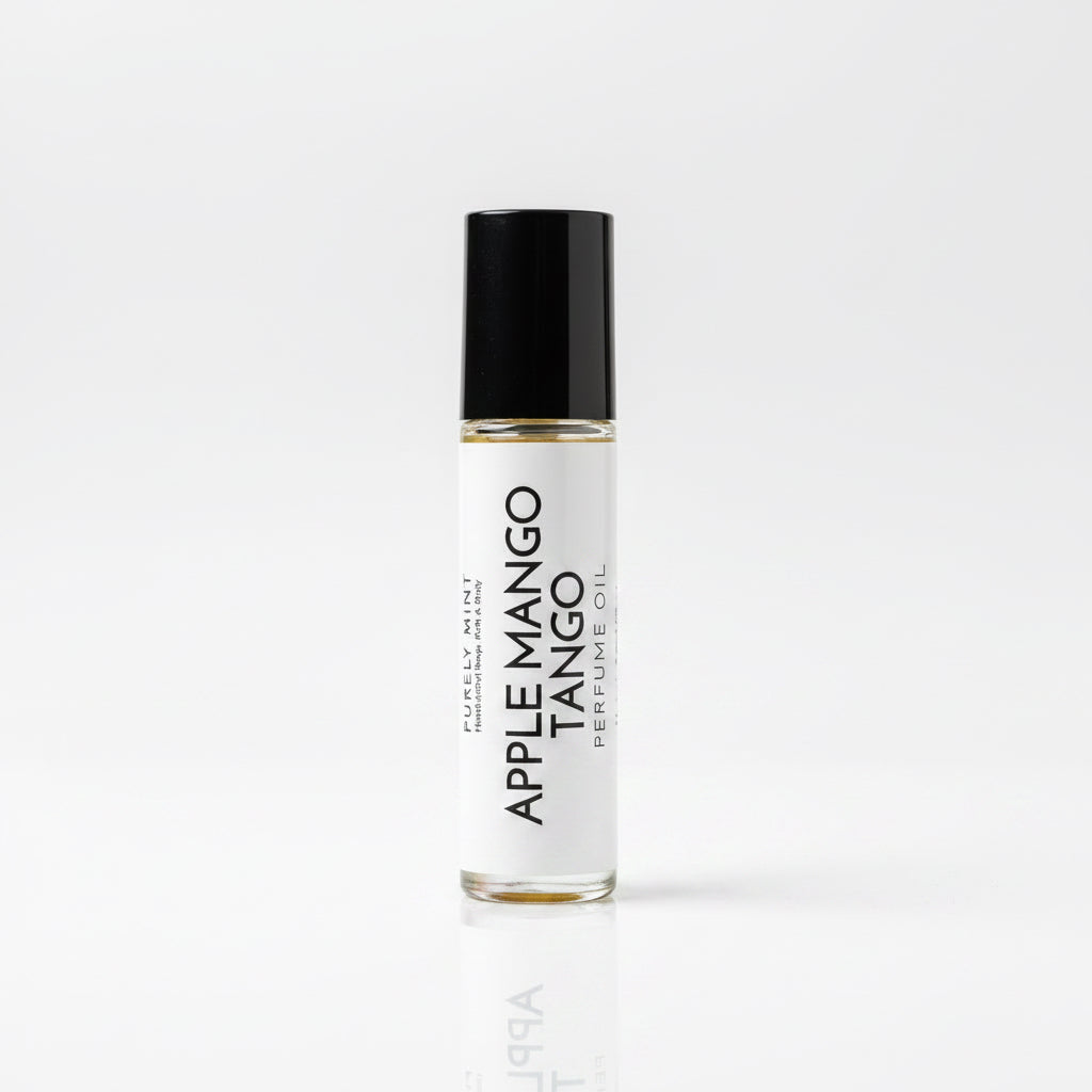 Perfume roller, white lable, black top, white reflective seamless backdrop.