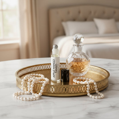 Perfume Roller, White label, metal ball, black top, in a modern bedroom on marble vanity with a gold tray, pearls and perfume on it. 