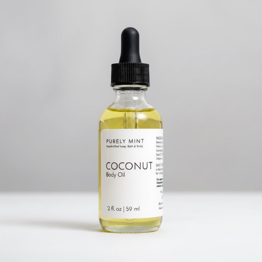 A 2 fl oz glass bottle of Purely Mint Coconut Body Oil with a black dropper cap, set against a neutral light gray background.