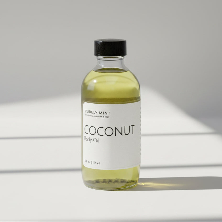 A 4 fl oz glass bottle of Purely Mint Coconut Body Oil with a black dropper cap, set against a neutral light gray background.
