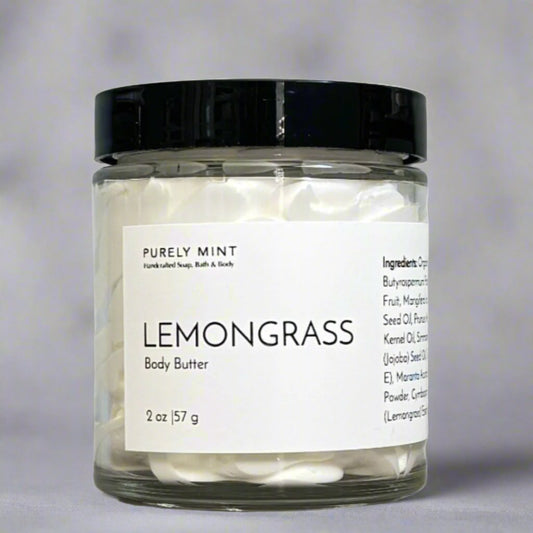 2 oz white body butter, glass jar, white label, black top, commercial photography packshot, light gray seamless backdrop, neutral lighting