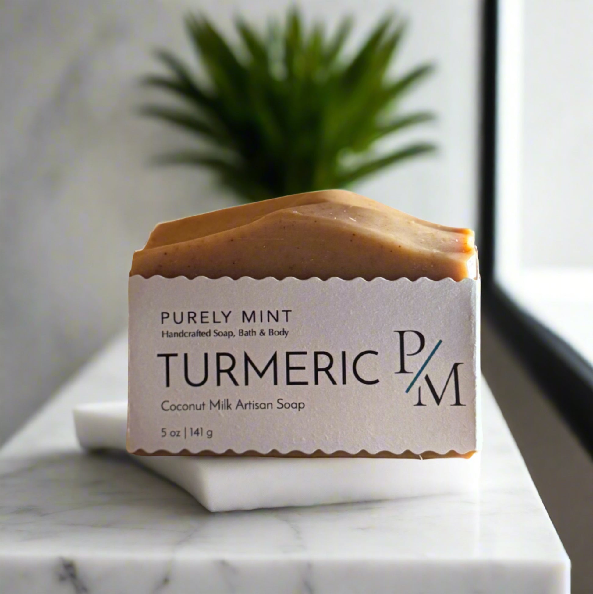 Rosmary Mint turmeric bar soap in white label in a modern bathroom, marble, luxury, spa, plants, commercial advertising photography