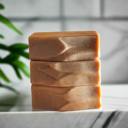 3 turmeric bar soaps in a modern bathroom, marble, luxury, spa, plants, commercial advertising photography