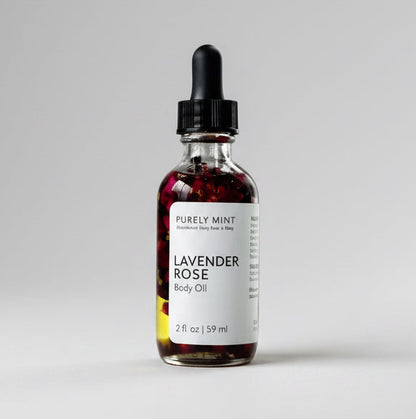 A 2 oz Bottle of Lavender Rose Natural body oil with a dropper on a light gray background