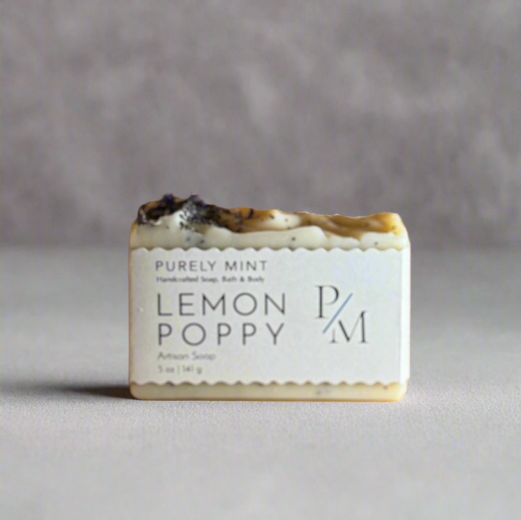 Artisan soap with white label, commercial photography packshot, light gray seamless backdrop, neutral lighting