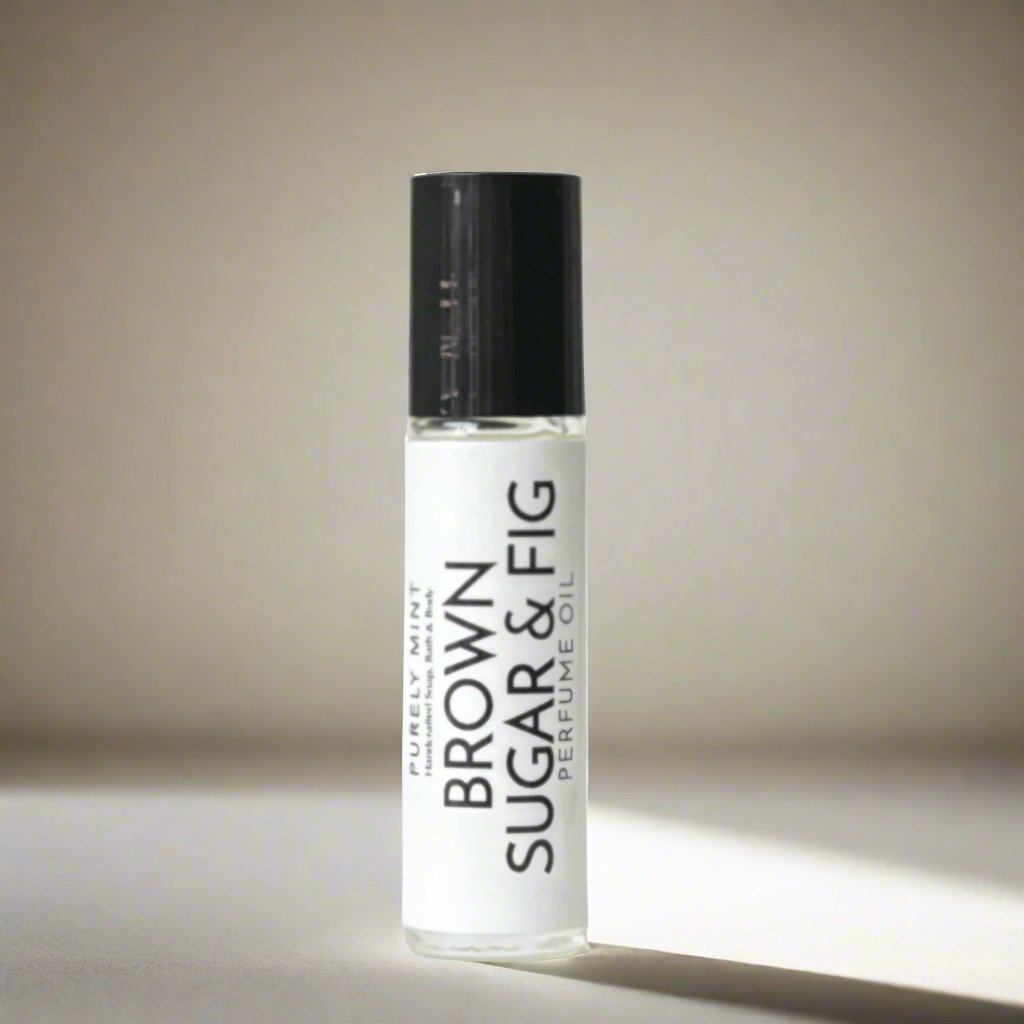 Brown Sugar & Fig Perfume Oil, white label, black top, soft sun shadow, 